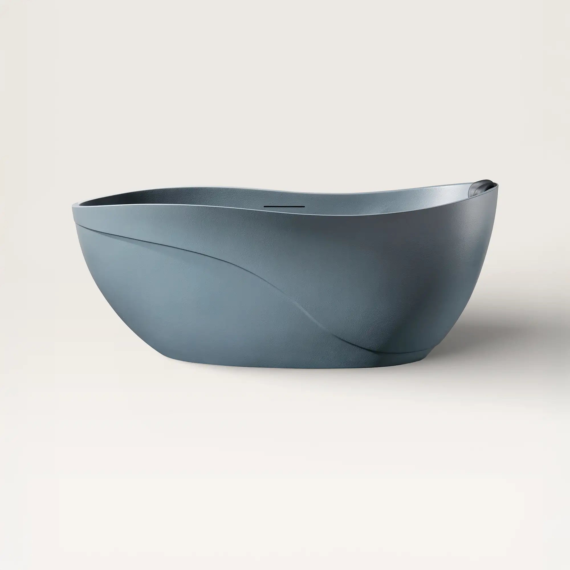 Front view of the Soma freestanding bath in blue-grey with a black magnetic pillow