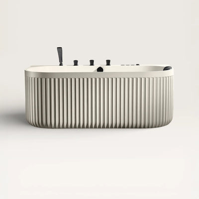 Front view of the DORIA Spa Bath in cream with black tapware