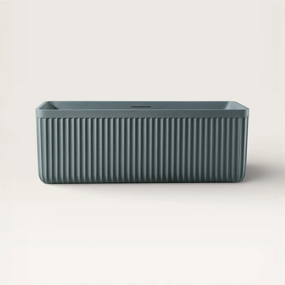 Front view of the KOLPA Back-to-Wall Bath in blue-grey