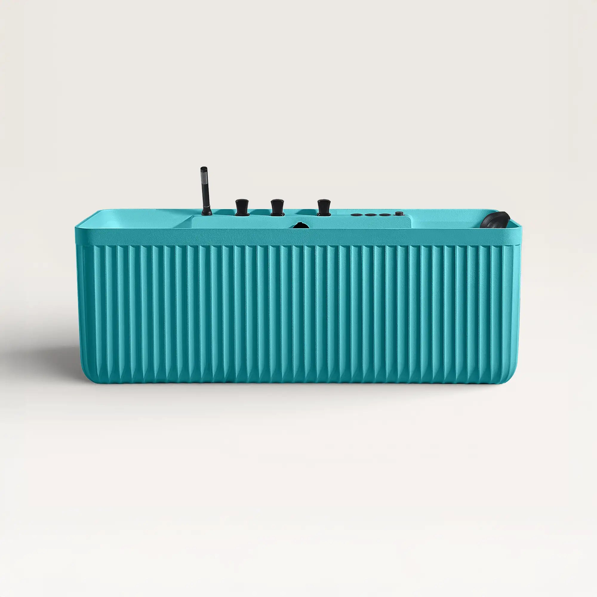 Front view of the Kolpa Spa bath with black tapware in celadon blue