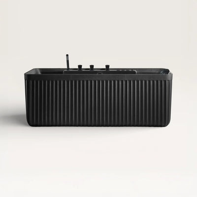 Front view of the Kolpa Spa bath with black tapware in black