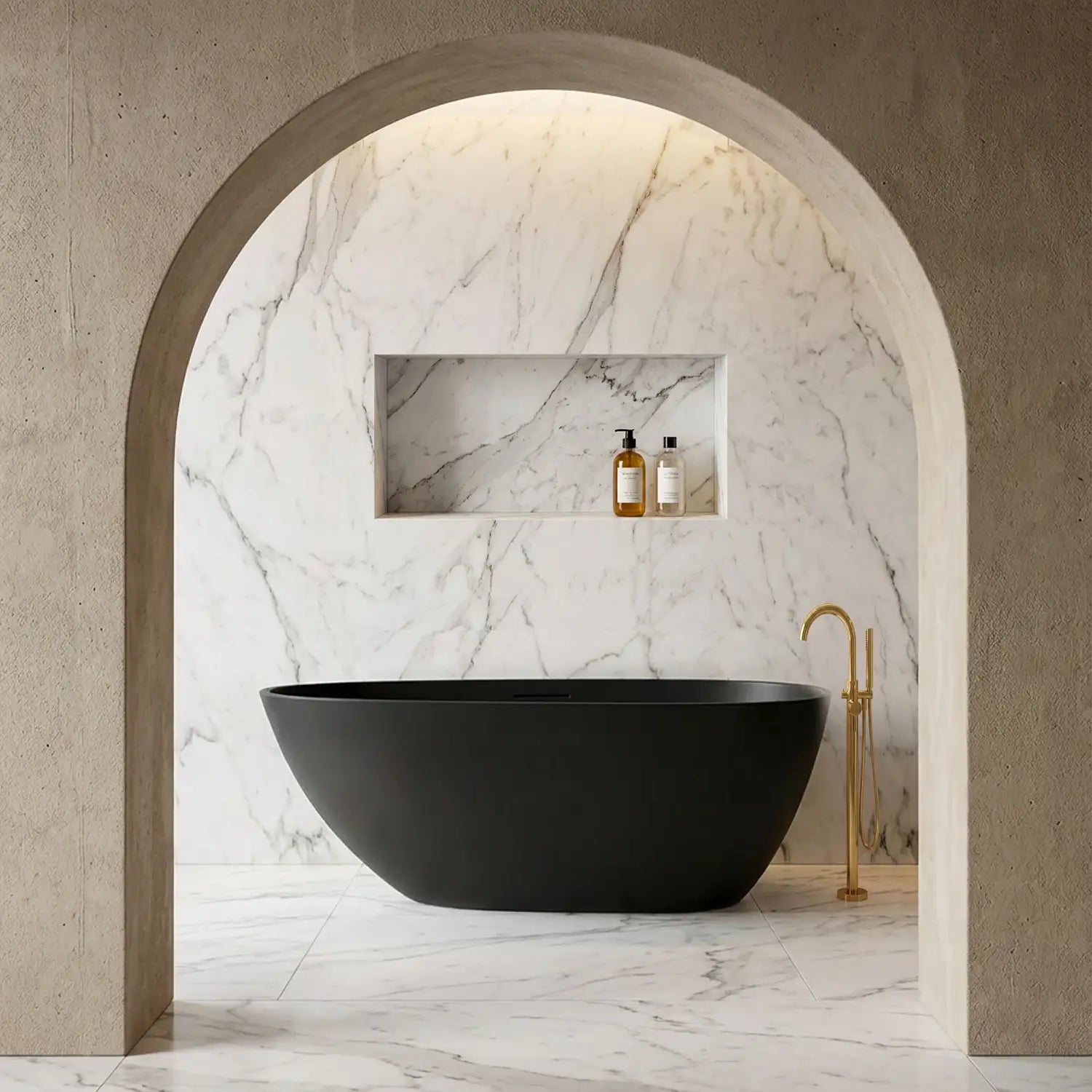 Modern bathroom with the ARIA 1700mm freestanding bathtub in black, marble walls, and gold fixtures. 