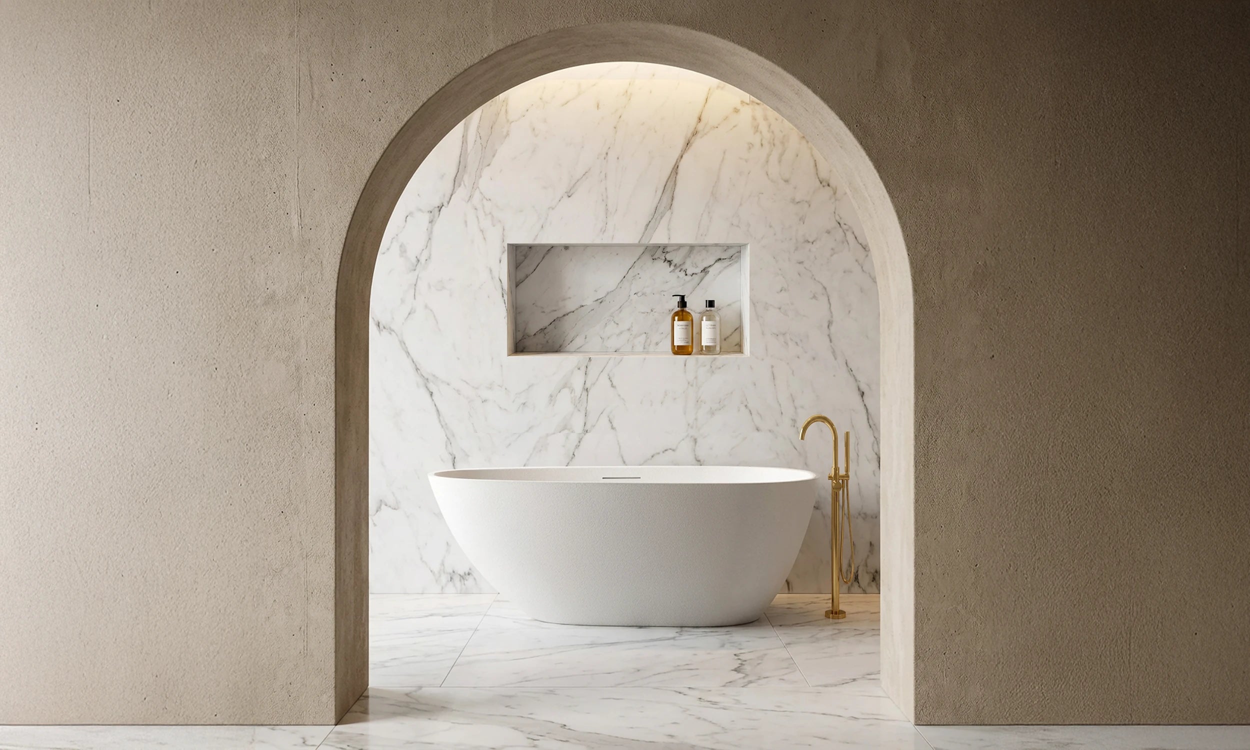 Modern bathroom with the freestanding ARIA bath in white, marble walls, and a neutral color palette.