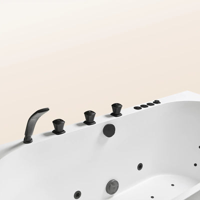 A top view of the Doria spa bathtub in white with black tapware, on a beige background