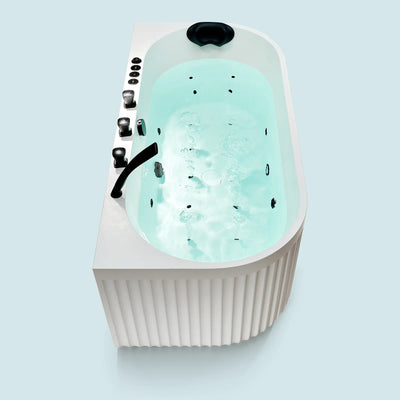 A top view of the Doria spa bathtub in white with black tapware, on a blue background